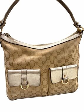 Gucci Abbey Pocket hobo bag GG monogram canvas metallic gold leather trim